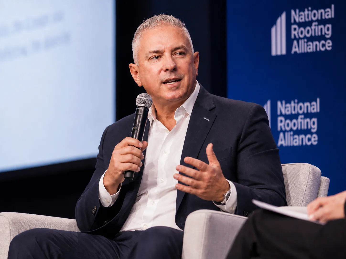 David Gembala speaking at a National Roofing Alliance industry presentation